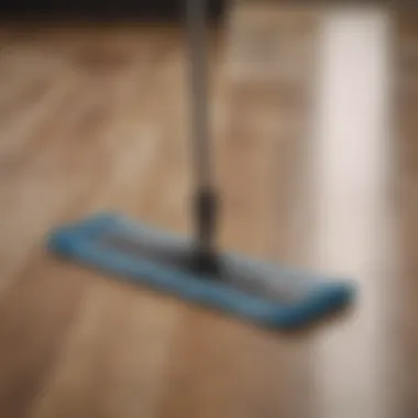 Detailed view of a microfiber mop gliding across a laminate floor