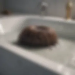 Close-up of hair clogging a bathtub drain