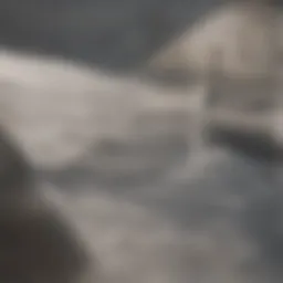 A close-up view of a glossy, clean shower drain.