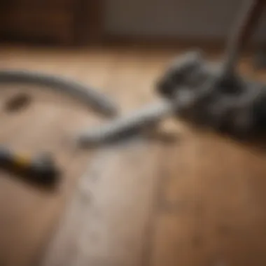Essential Maintenance Tools for Hardwood Essential tools for maintaining hardwood floors displayed neatly