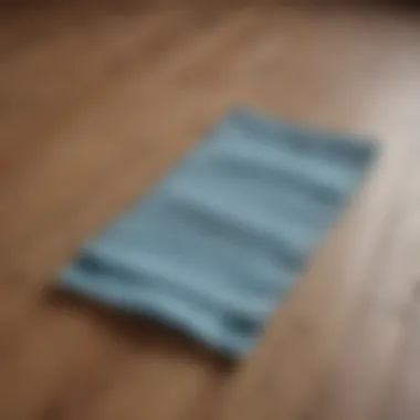 Close-up of a microfiber cloth on a laminate floor