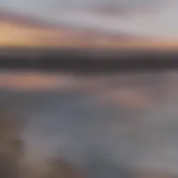Sunset view over Pacific Beach with surfers